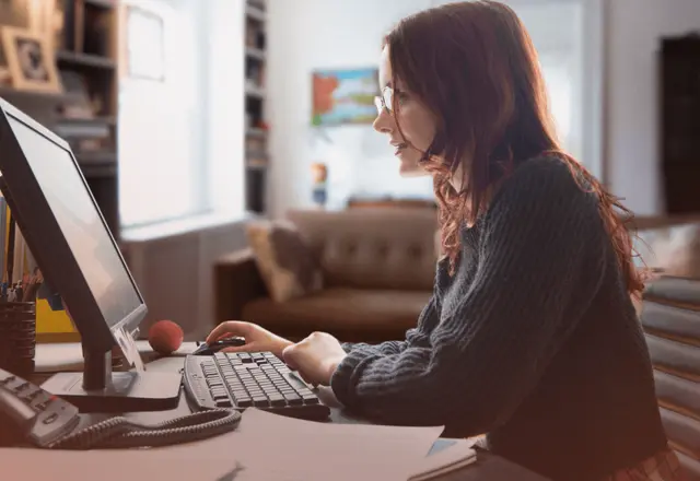 Business professional researching a custom software development company on desktop.