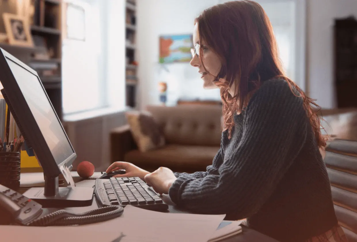 Business professional researching a custom software development company on desktop.